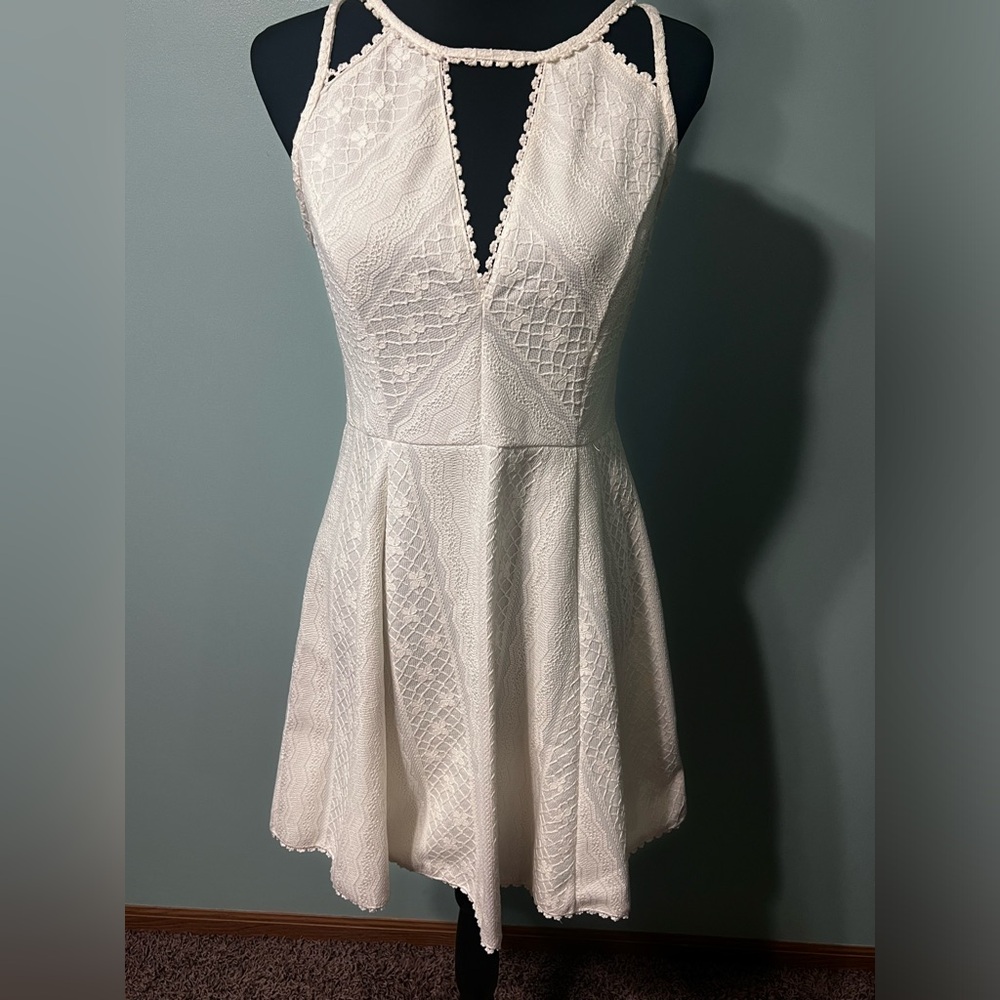 Free People white dress with gorgeous detailing! Size 12